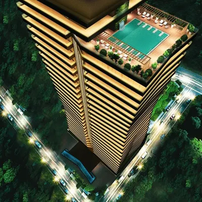 An aerial view of the Embrace Tower concept at night, showcasing its rooftop pool and distinctive, layered form. The design connects life and style, with wrap-around balconies that offer expansive views of the city.