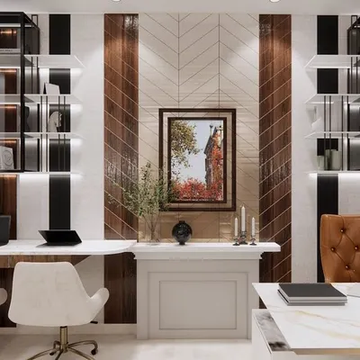 A home office in Mathura designed with a modern classic aesthetic. The room features a striking wall with alternating panels of wood and white, creating a visually interesting backdrop for the dual workstations.