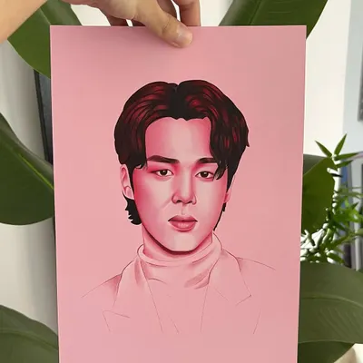 A monochromatic portrait of Jimin from BTS. Using a limited palette of reds and pinks on toned paper allows me to create a really focused and artistic piece.