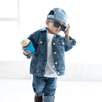 This little guy has so much swag! A cool toddler portrait with a full denim outfit, sunglasses, and a prop coffee cup.