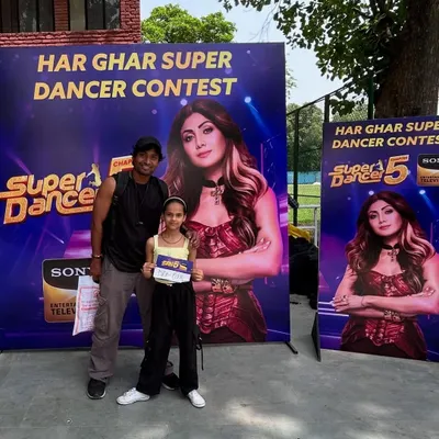 I believe in being there for my students every step of the way. Here I am with one of our dedicated dancers at the 'Super Dancer Chapter 5' television auditions, providing support right where it counts.