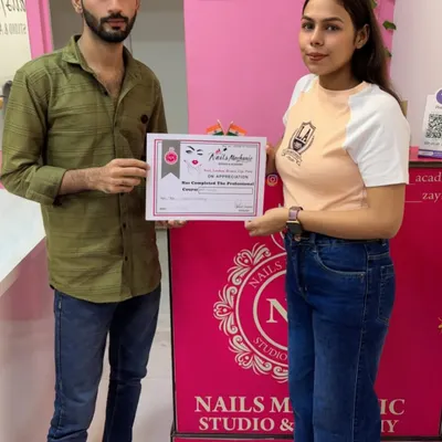 Another proud moment as a student completes her professional nail course. This certificate is proof of her hard work and readiness for the industry.