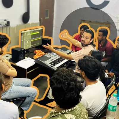 Our instructor breaks down a complex audio project for a group of engaged students. The curriculum is built around practical application, ensuring every student understands both the theory and the "haath ka kaam" of audio engineering.