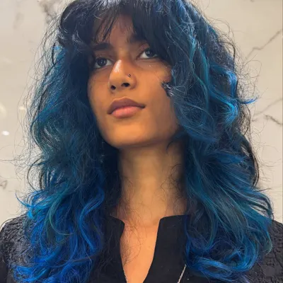 Blue hair fun! A close-up of this vibrant blue look, showing the texture and layers.