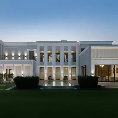 The completed reality of our Chhattarpur farmhouse project at dusk. This photo is the culmination of years of design and construction, a proud moment where the built form perfectly matches our original vision.