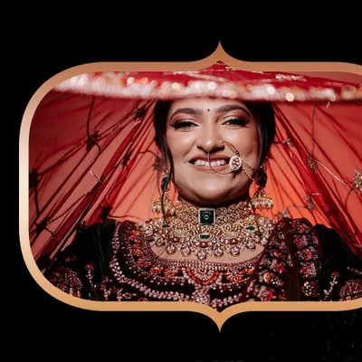 A stunning close-up of our bride, her happy smile shining through her veil. Every bride is a work of art.