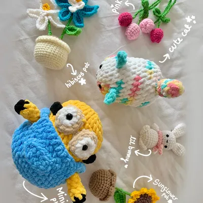 Here’s a little family photo of some of my favorite custom creations. You can see a Minion plushie, tiny potted plants that never wilt, a colorful cat, a bunny keychain, and floral charms. If you can dream it, I can probably crochet it.
