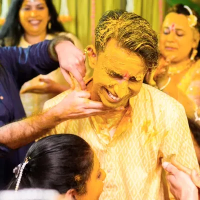 Haldi is all about getting covered in yellow, and Rugved's friends and family made sure of that. This is what I call happy chaos, and it makes for the most energetic and fun photos.