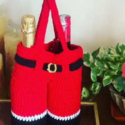 The Santa pants wine bottle cover is a festive and memorable way to gift a bottle of wine to your loved ones this Christmas.