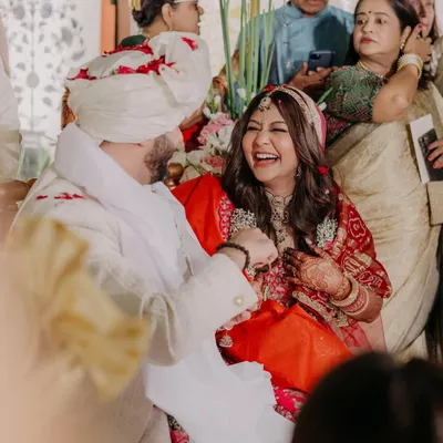 This picture is pure joy. Capturing the genuine laughter and happiness of a bride on her wedding day is the most rewarding feeling. My job is to ensure her makeup looks flawless through every smile.