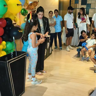 Here I am with a young assistant during a trick at Shahid Kapoor's son Zain's birthday party. I always make sure the birthday child and their friends feel like they are part of the magic.