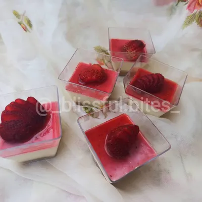 My individual Strawberry Cheesecake cups are a perfect seasonal treat. They feature a creamy cheesecake base topped with a fresh strawberry compote and a sliced strawberry.