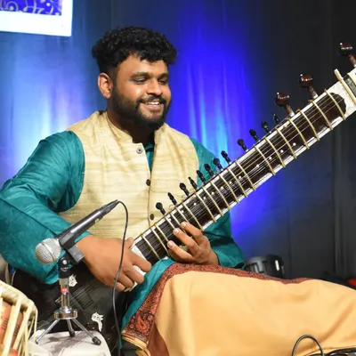 A happy moment from a live classical concert. Performing on stage is a joy, and this experience helps me bring energy and precision to live band studio recordings.
