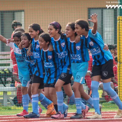 Pure joy and teamwork from our girls' team after a great play. We are committed to providing a supportive and empowering environment for female footballers to thrive and compete at the highest level.