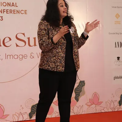 On stage at a national conference, discussing the intersection of style, image, and wellness. A well-chosen blazer, like this handloom Kalamkari piece, adds a layer of authority and cultural richness.