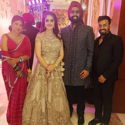 Posing with one of our lovely couples after their sangeet. Seeing our clients shine on their big day is the best part of our job.