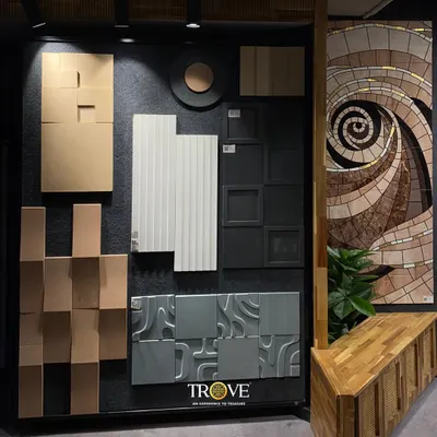 This display board shows the variety of textures I offer. From a swirling mosaic and 3D geometric patterns to fluted and ridged surfaces, these tiles are designed to be touched and admired, adding a layer of sophistication to your walls.