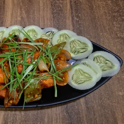 My delicious Chicken Dry Fry made with fiery king chilli. The chicken is tossed with onions and capsicum, giving it a spicy and tangy flavour that is very addictive.