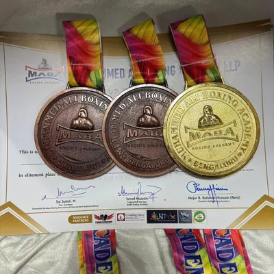 The haul from the Super 40 Elite Men Boxing Championship. One gold and two bronze medals earned through dedication and smart training.