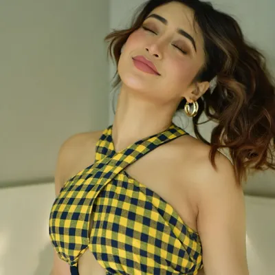 A fun and sunny shot for a promotional campaign with actress Shivangi Joshi. The goal was to capture a playful, "bee-ing myself" vibe that felt authentic to her personality. The natural light and cheerful styling resulted in a warm and engaging image.