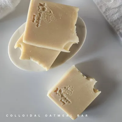 For the little ones with sensitive skin, I created this Colloidal Oatmeal Bar. It's made with gentle, plant-based ingredients like shea butter and cocoa butter, and I even stamp it with a cute little cow design.