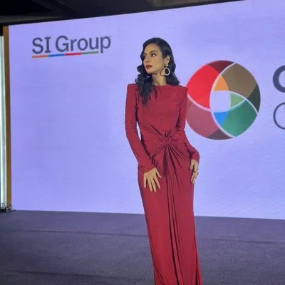This is a powerful and sophisticated look I created for an emcee hosting a corporate event. The makeup features a classic red lip and defined eyes, paired with vintage-inspired Hollywood waves. It's a look that commands attention on stage.