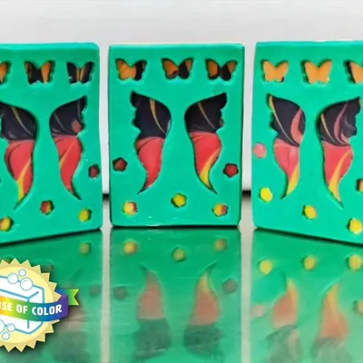 I'm so proud that these butterfly soaps won a recognition award for "Best Use of Color"! This was for a "Peekaboo" soap challenge, where a sheet of soap dough is placed over a swirled soap base.