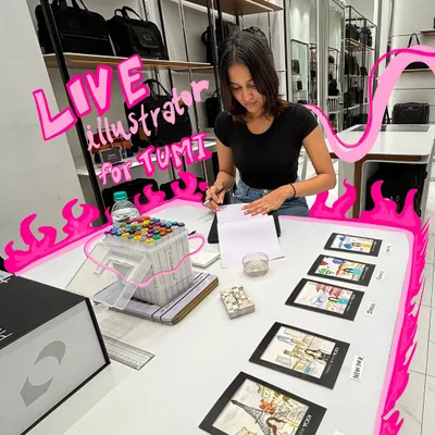 My live illustration station set up for a TUMI store launch. I come prepared with all my professional tools, including high-quality pens and paper, to create beautiful, quick portraits for everyone.