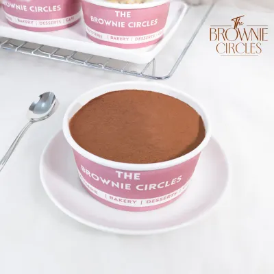 Our authentic Tiramisu Tub is a customer favorite for a reason. We layer coffee-soaked sponge fingers with a light and creamy mascarpone mixture, finished with a generous dusting of cocoa powder.