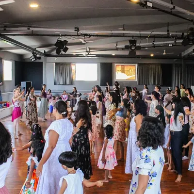 A wide shot of our Mother's Day celebration, with the studio full of students, mothers, and siblings all dancing together. It was a day filled with love and shared movement.