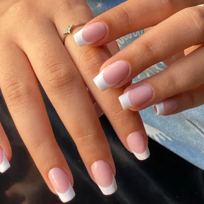 You can never go wrong with a classic. A perfect, crisp white French manicure on clean, square-shaped gel extensions.