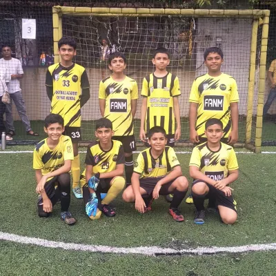Our Under-14 team posing for a photo after securing the runner-up trophy at the Freedom Cup. I am incredibly proud of their hard work and team spirit.