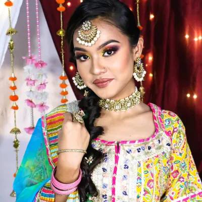 A beautiful and bold rainbow eyeshadow look, perfect for a bride who wants to experiment and have fun with her Haldi or Mehndi makeup.