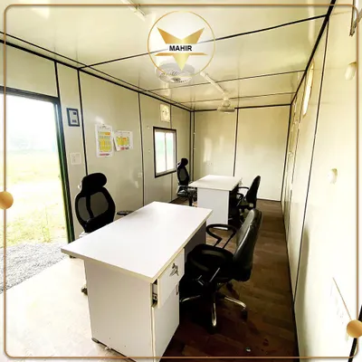 Step into your new site office. This container is set up with multiple workstations, demonstrating how we create ready-to-work environments that can be deployed anywhere.