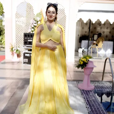 A candid moment from a beautiful poolside Haldi ceremony. I love the vibrant and happy atmosphere of daytime wedding functions.