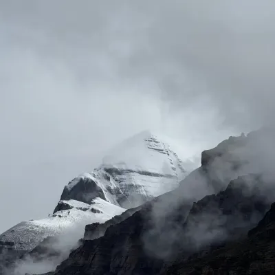 The sacred Mount Kailash, veiled in mist and cloud. To be in its presence is not a destination to be reached, but a grace to be received. This is the heart of our yatra, a moment of profound stillness and darshan.