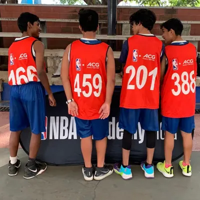 Geared up and ready to compete. Our players stand together before taking the court at the Jr. NBA Academy tryouts in Delhi. These events are a crucial step for young athletes looking to gain exposure and experience.