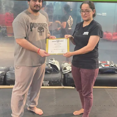 Celebrating another student who has earned her certification. Her hard work and dedication are an inspiration to everyone in the class.