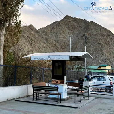 A wide view of our Smart Solar Hut installed for DIHAR-DRDO in Leh, set against the stark mountain landscape. This shelter is a testament to our engineering, designed to provide reliable, off-grid power and amenities in the most demanding environments.