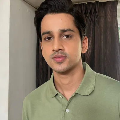 A super minimal and natural look for actor Ankit. For men's grooming, the goal is to make the skin look healthy and even-toned for the camera, without any visible makeup.