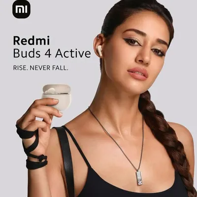 The official campaign image for Redmi Buds 4 Active with Disha Patani. I created a sharp, edgy makeup look with a winged eyeliner to match the 'Rise. Never Fall.' tagline.