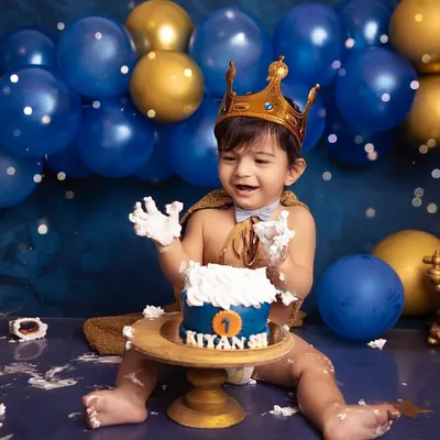 The pure joy of a first birthday cake smash! This little prince couldn't have been happier, and capturing that laughter amidst the frosting is what makes these sessions so special.