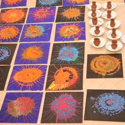 A beautiful display of spin art and miniature pottery creations. These activities show how scientific principles like centrifugal force and material science are the basis for beautiful art.