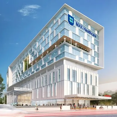 This rendering showcases the upcoming 419-bed Max Nirogi super-speciality hospital in East Delhi. The design follows a clear massing logic, with outpatient zones at the base and inpatient units above for efficiency and privacy.