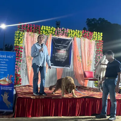I was deeply honored to be invited as a Senior Dog Behaviorist and judge for a dog show at the Dhaula Kuan Army Cantt. Here I am on stage, speaking to the participants and their families.