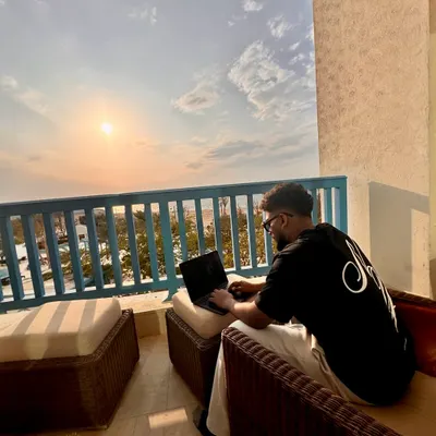 My office isn't always a dark club. Inspiration for new mashups and remixes can strike anywhere, even while working on my laptop with a sunset view.