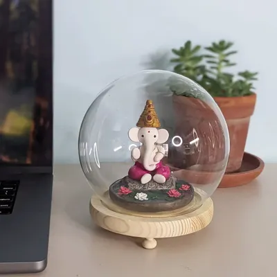Celebrate Ganesh Chaturthi with a handmade polymer clay Ganesha idol. This one sits in a glass dome on my desk, bringing peace and charm to my workspace.