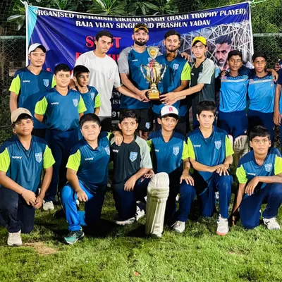 Champions. The Delhi Cricket Hub team posing with the trophy after another tournament win. This is what teamwork looks like.