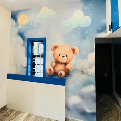 I created this gentle and dreamy mural for a nursery. A cute teddy bear sits on soft clouds under the moon and stars, making for a comforting and sweet environment for a young child.