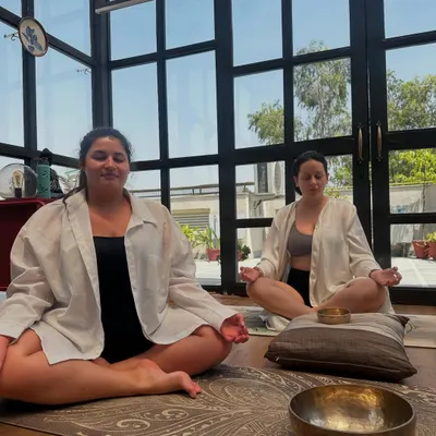 A moment of deep relaxation for my students from Armenia during a sound healing session. The Tibetan bowls help calm the mind and balance the body's energy.